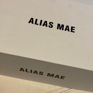 Alias Mae woman’s brand new ankle wrap black leather sandals in size 9.